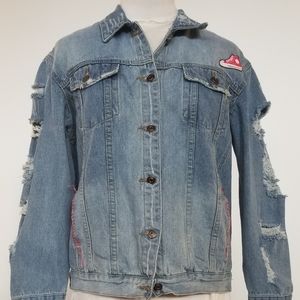 Distressed denim jacket with red converse patch